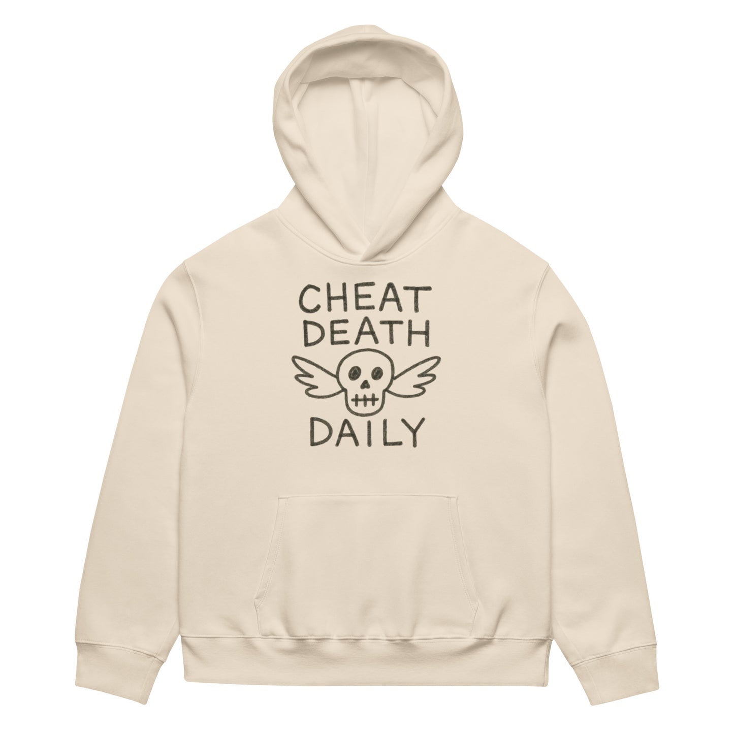 Person wearing a beige hoodie with Cheat Death Daily' text and skull  design. By Highway Division HWY DIV