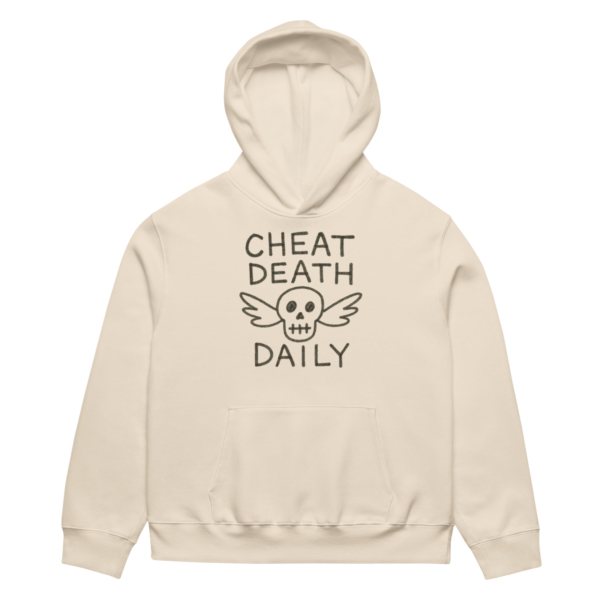 Person wearing a beige hoodie with Cheat Death Daily' text and skull  design. By Highway Division HWY DIV