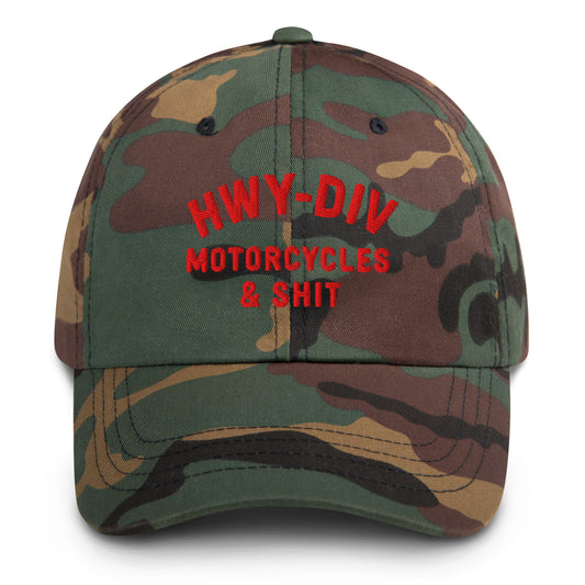 Camouflage cap with red text on a white background