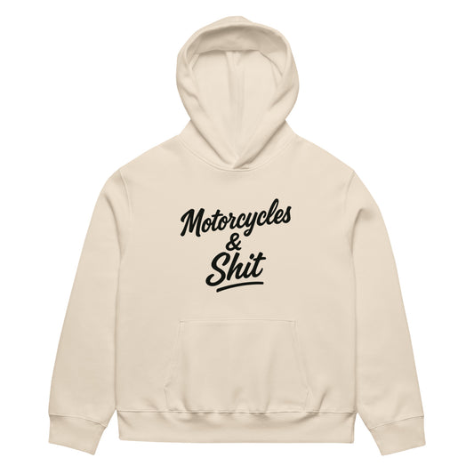 Black heavyweight hoodie by Highway Division with bold white “MOTORCYCLES & SHIT” front graphic; Harley Davidson Dyna and Road Glide inspired motorcycle streetwear for riders, outlaw attitude, wheelie culture.