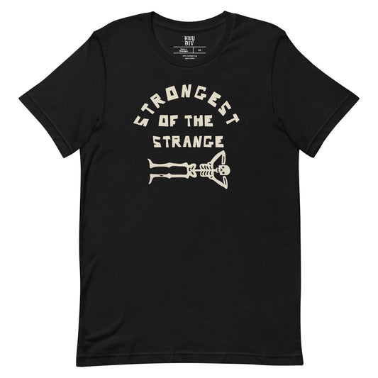 "Black t-shirt with bold Strongest of the Strange text on the front, unisex graphic tee celebrating individuality and outsider culture, perfect for fans of alternative fashion, streetwear, and those who embrace the strange and unconventional