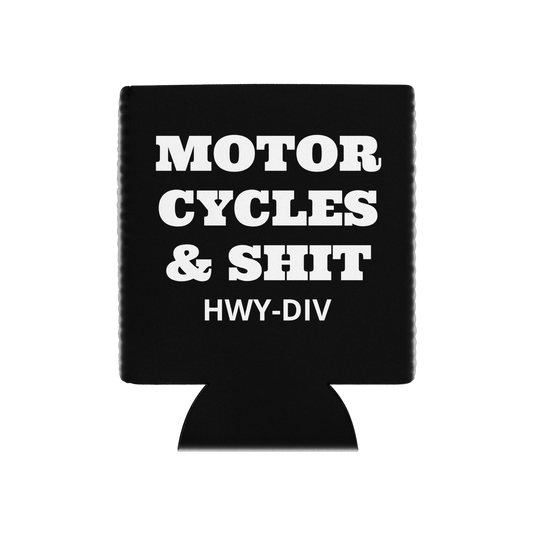 Black can cooler with bold white text that reads 'Motorcycles and Shit' by Highway Division, wrapped around a beer can, placed on a Harley-Davidson motorcycle seat.