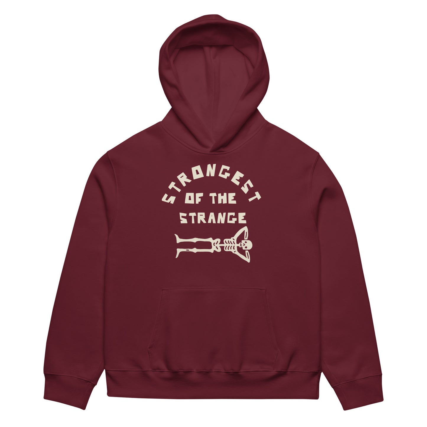 Black hoodie with bold Strongest of the Strange text on the front, heavyweight unisex pullover sweatshirt designed for fans of alternative fashion, outsider culture, and streetwear, featuring a soft fleece interior, front pouch pocket, and ribbed cuffs for all-day comfort with a rebellious edge.